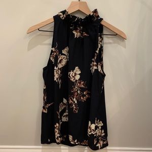 Blue blouse with floral designs